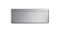 Daikin Stylish silver air conditioner unit with sleek design, mounted on a wall, featuring digital display and modern cooling vents.