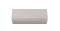 Daikin Sensira FTXF-E air conditioner unit mounted on a wall, showcasing sleek design and modern cooling technology.